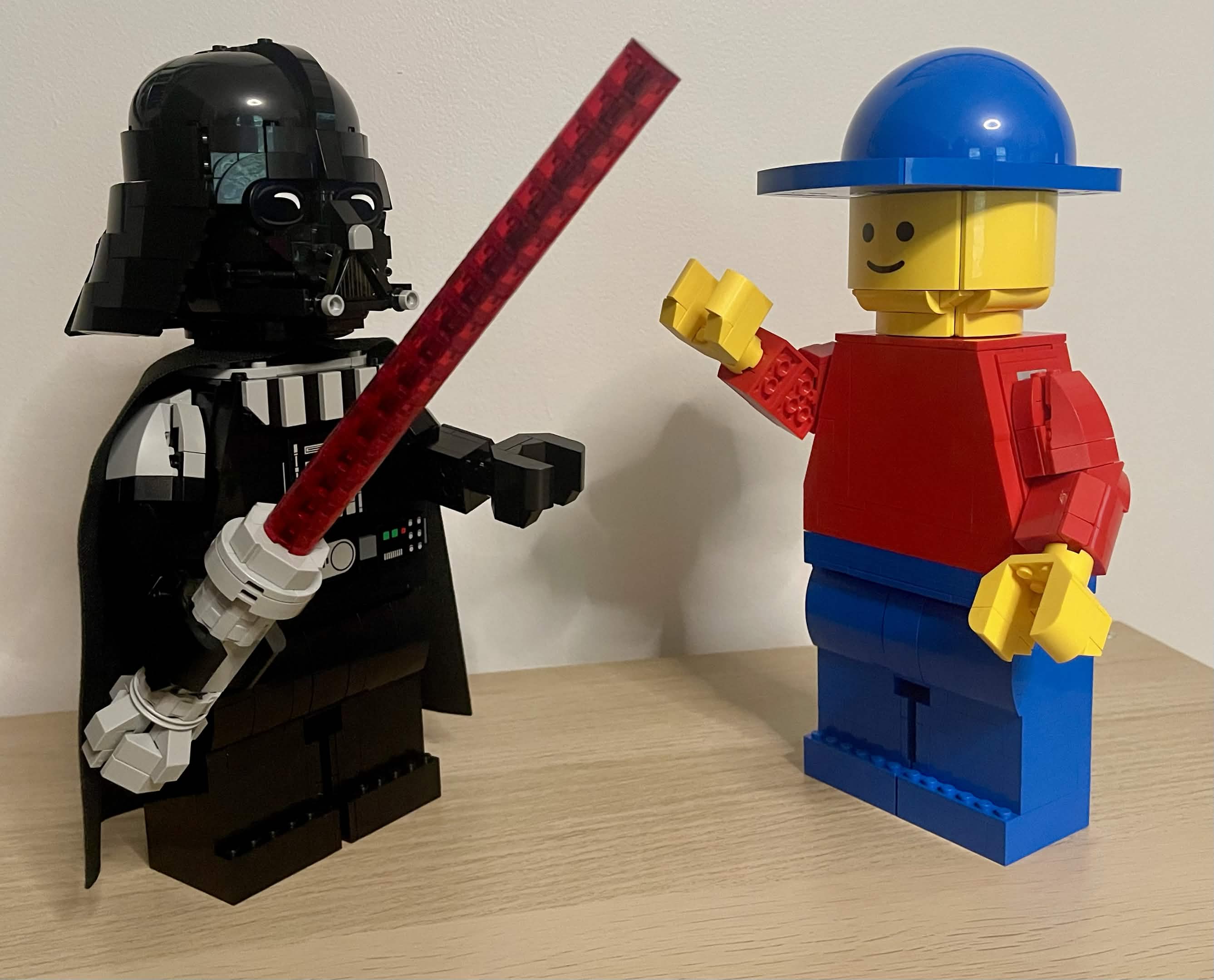 LEGO 75461 Darth Vader Up-Scaled next to 40649 Classic Space Astronaut Up-Scaled