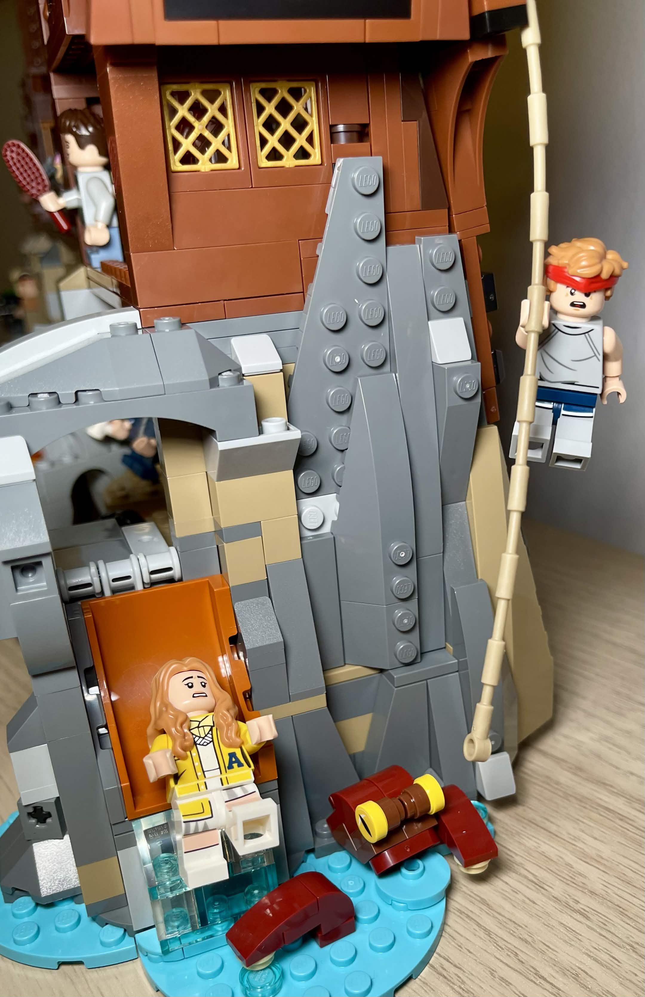 LEGO 21363 The Goonies Andy going down the slide with Brand swinging on the rope
