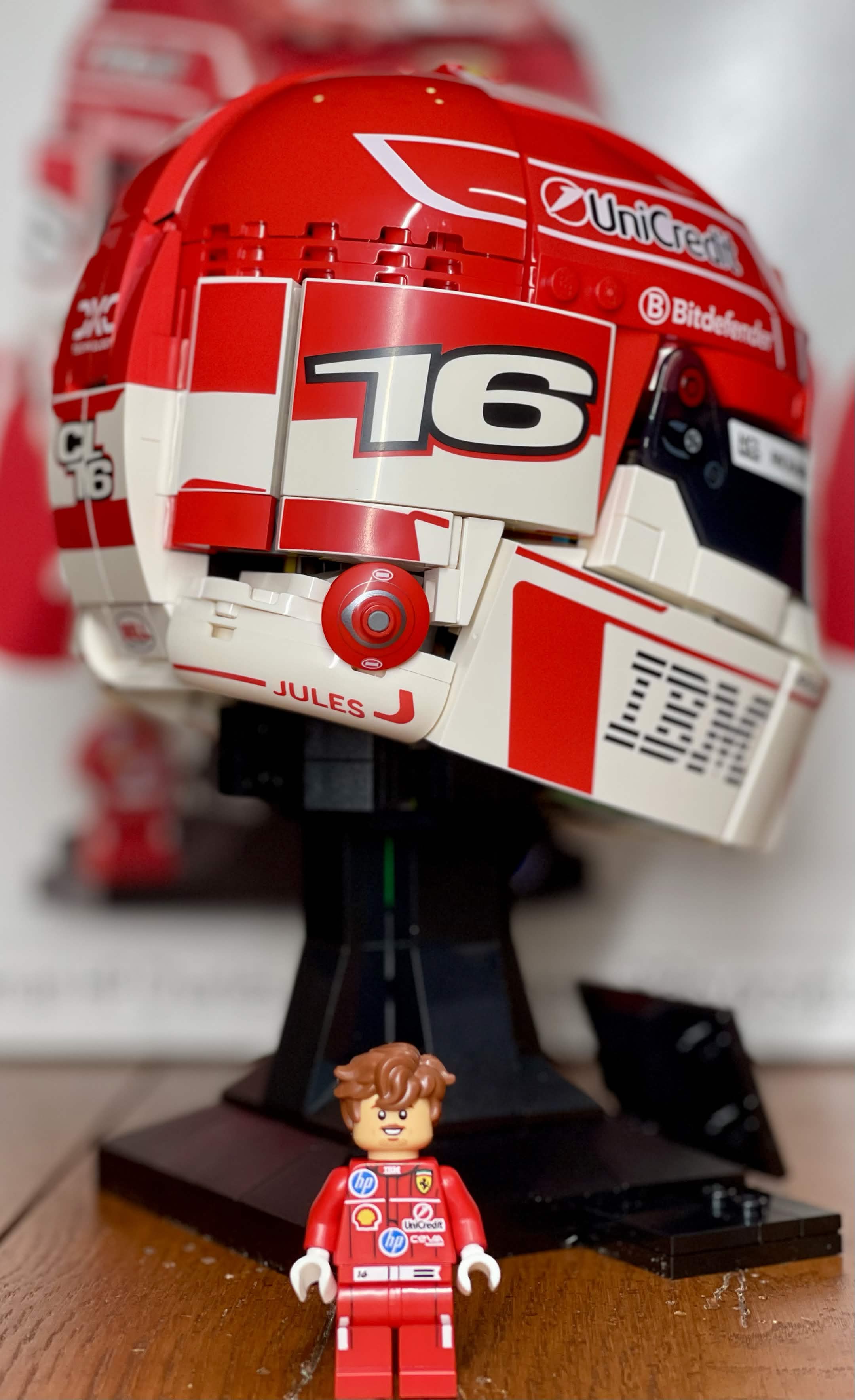 LEGO 43014 Leclerc Helmet front-on view with Charles Leclerc LECLERC backdrop